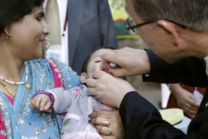 Secretary General Ban Ki-Moon and Mrs Ban, give a few indian children a polio Vaccination in the UN complex, New Delhi India Oct 31, 2008